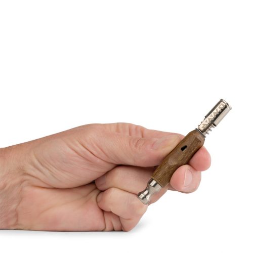 dynavap darkwood omnivong in hand 6f941c31 7df2 49f5 8625 525c1f48a146